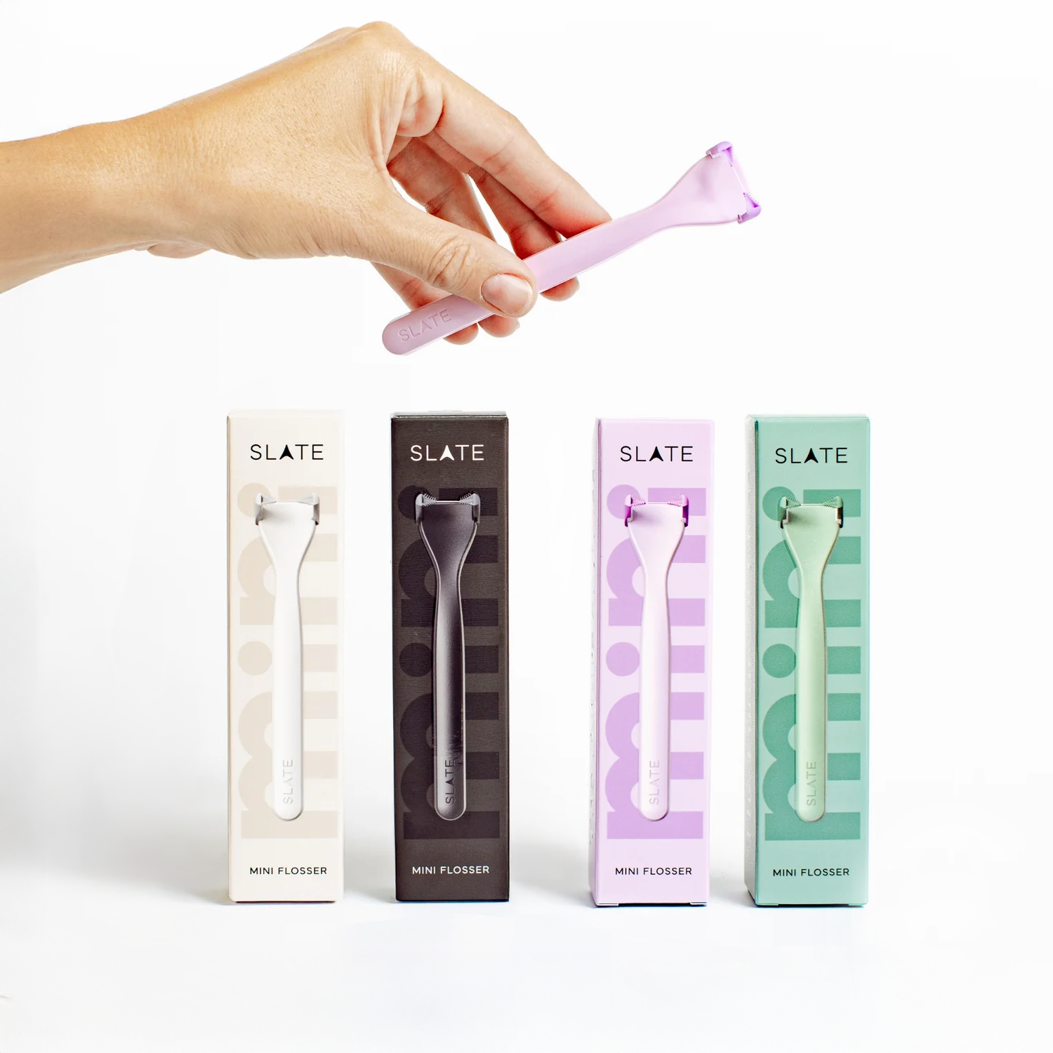 Slate Mini Flosser hilo dental portátil reutilizable en colores variados con estuche, limpieza interdental fácil