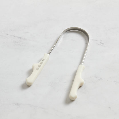 Raspador Fygg junto a pasta dental y mentas NOX: ecosistema completo de higiene oral funcional
